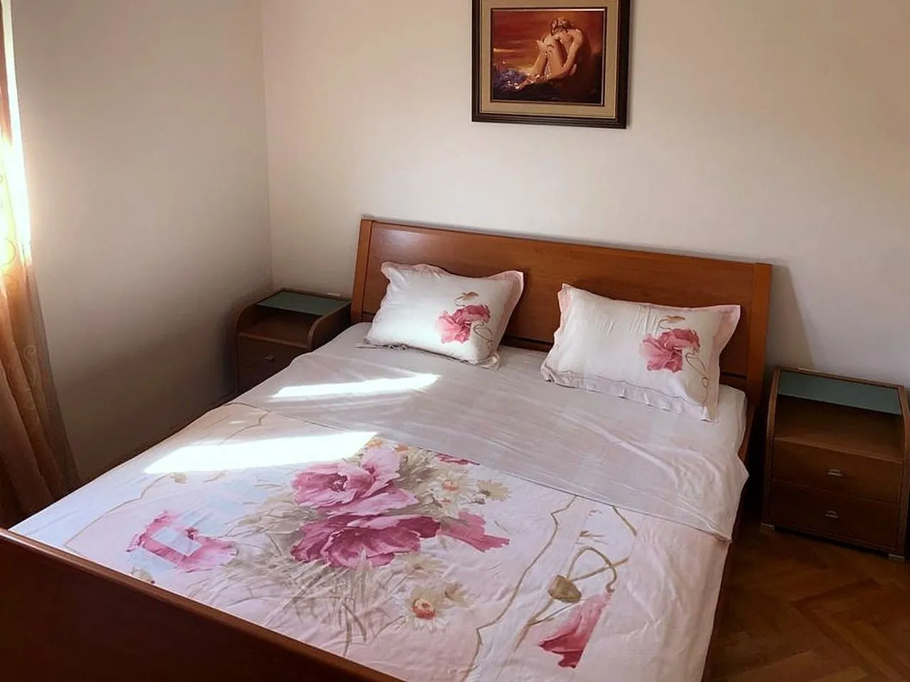 Bedroom with a double bed and bedside tables.