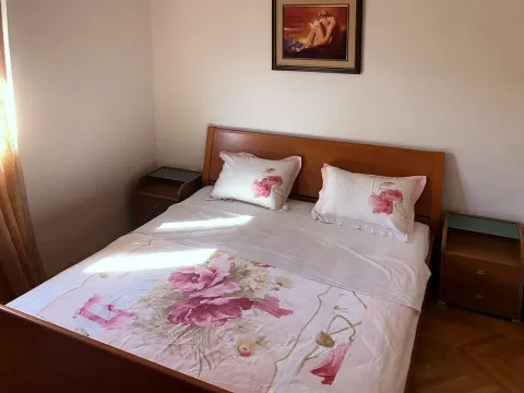 Bedroom with a double bed and bedside tables. - image 7