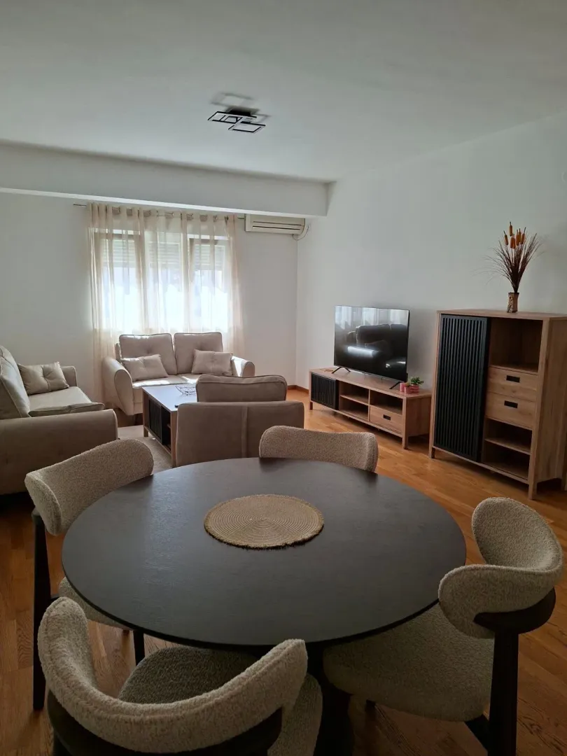 Living room with a dining table and seating set.