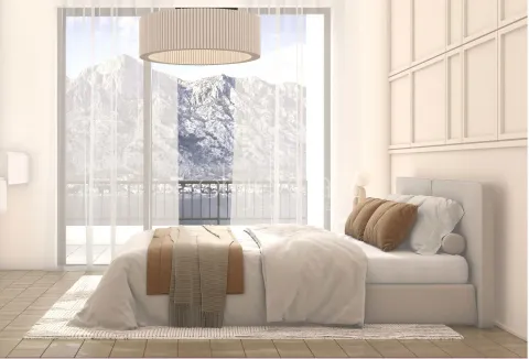 Bright bedroom with a large double bed and a view of the mountains through a glass balcony door. - image 7