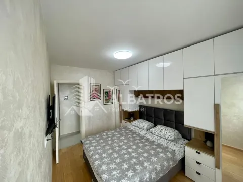 Furnished bedroom with a double bed and built-in wardrobes. - image 5