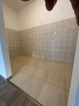 Empty room with wall and floor tiles. - image 8