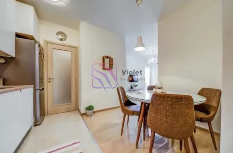 Kitchen with dining area and modern furniture. - image 4