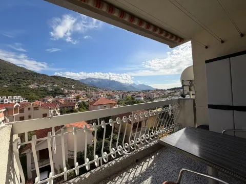 Furnished terrace with a view of the settlement and mountains. - image 5