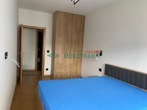 Furnished bedroom with a double bed and a fitted wardrobe. - image 11