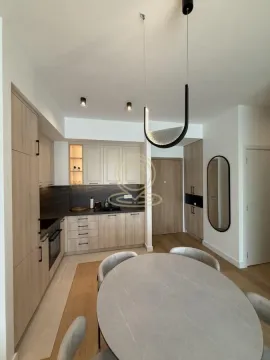 Kitchen with dining area and modern interior elements. - image 5