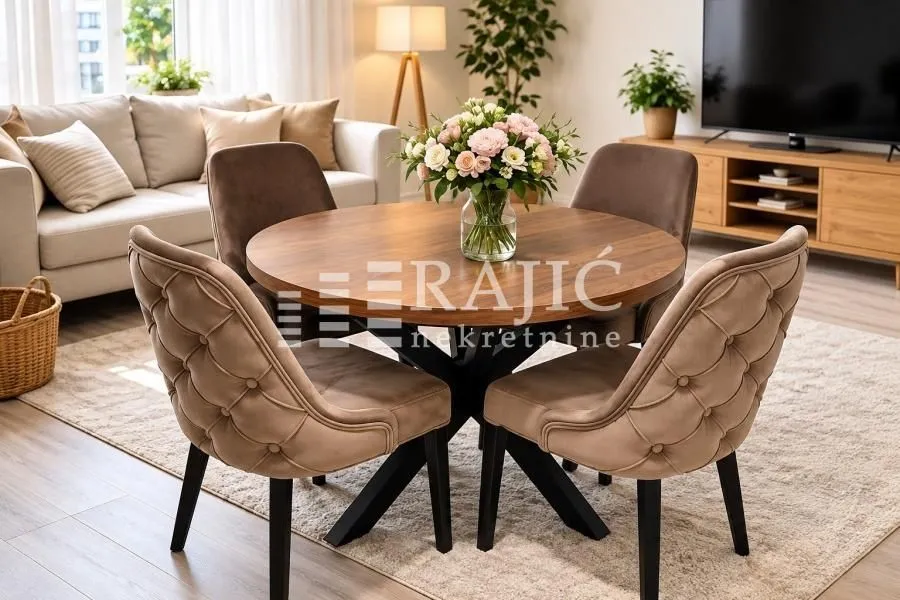 Living room with a dining table and chairs.