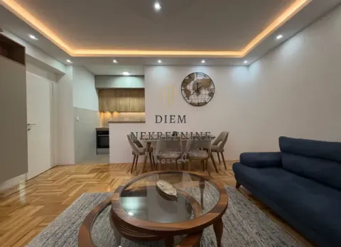 Living room with dining area and a view of the kitchen. - image 3