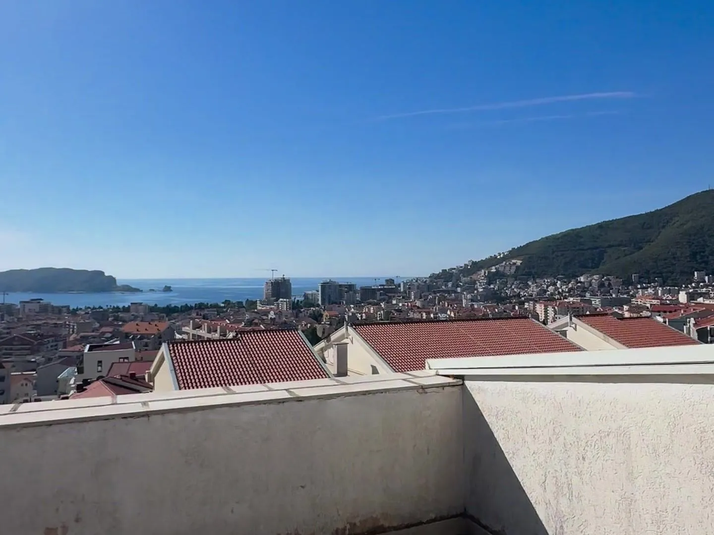 View of the city and the sea from the terrace.