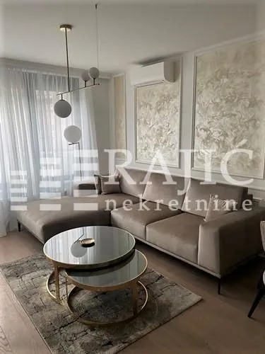 Modern and tidy living room with a sectional sofa.