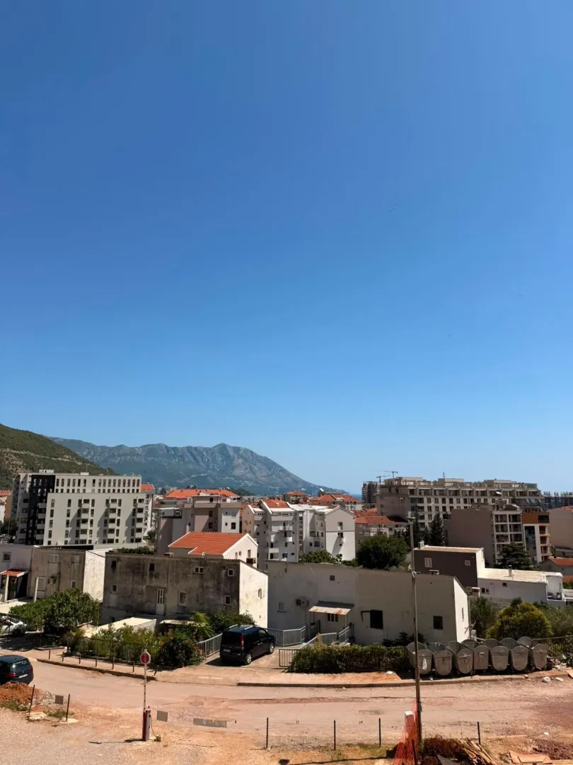 View from the terrace towards the neighborhood and surrounding mountains.