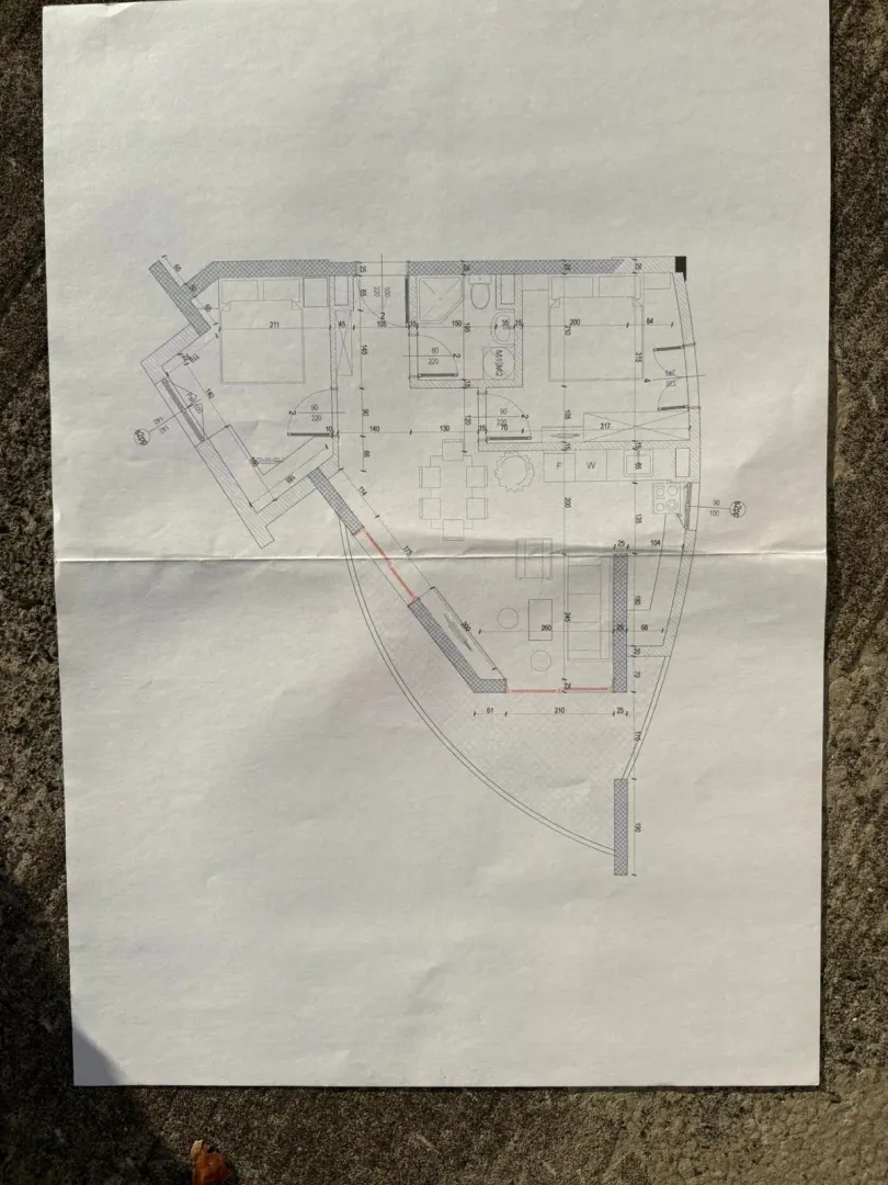 The apartment floor plan shows the layout of the rooms with dimensions.