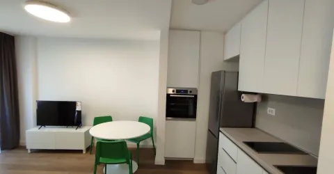 Living room with dining area and kitchen. - image 2