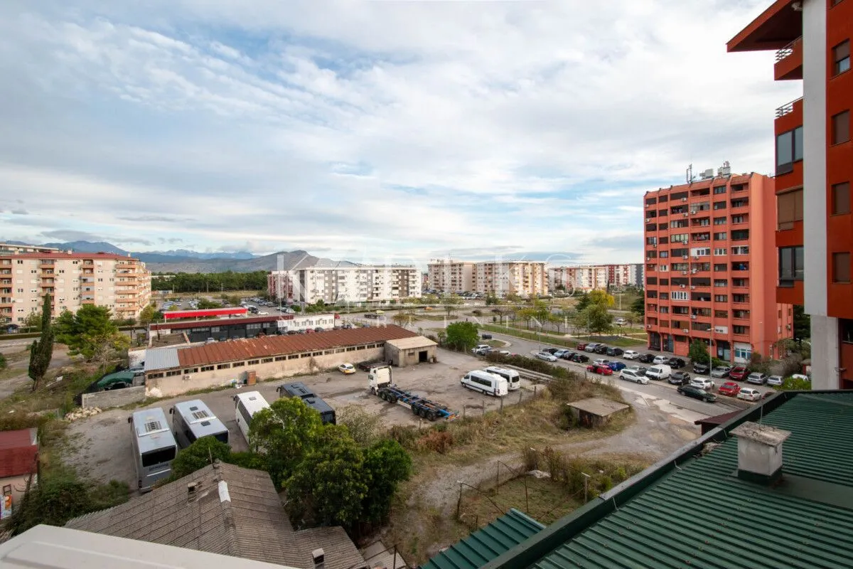 View from the terrace of the city neighborhood and surrounding buildings.