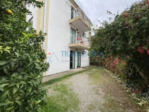 Exterior of the building with a yard and greenery. - image 2