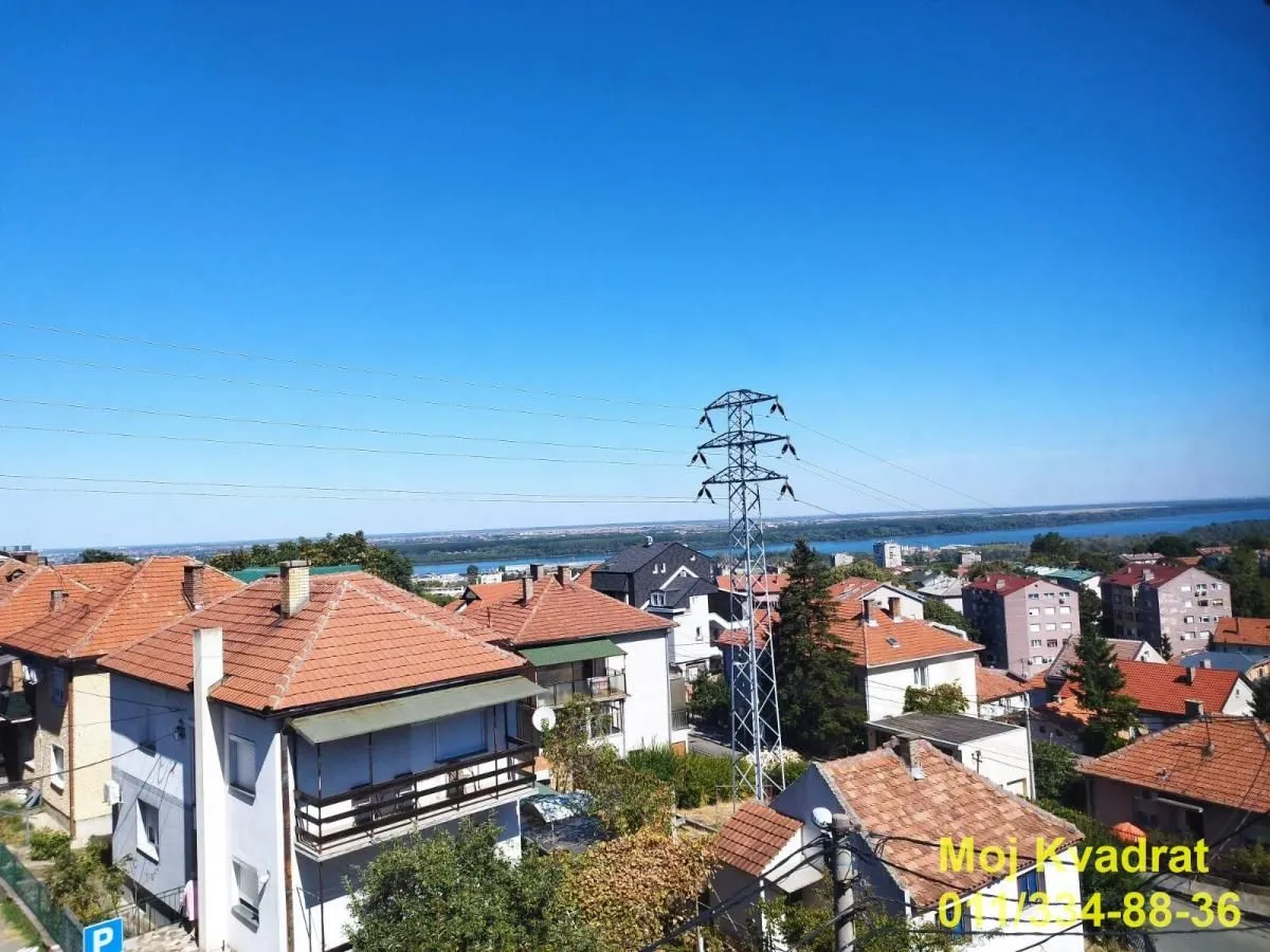 Elevated view of the surrounding buildings and river.