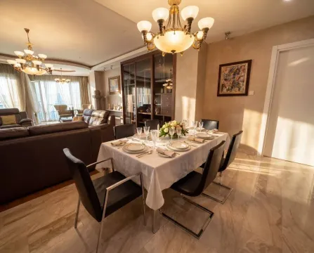 Spacious living room with a dining area and elegant furniture. - image 5