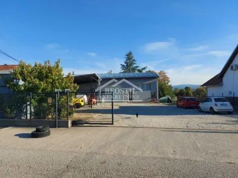 View of the courtyard and exterior of the property with a parking area. - image 2