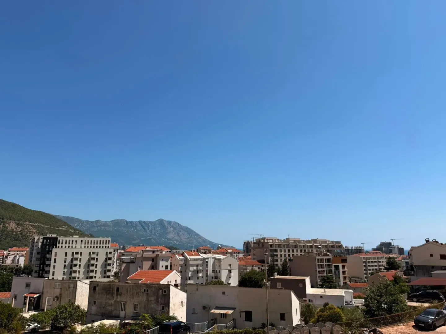 View of the city and distant mountains from the terrace.