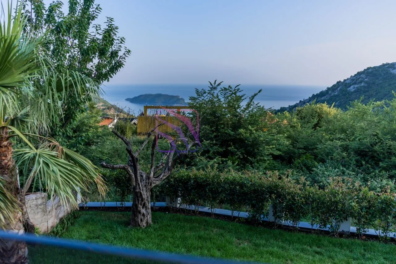 View of the sea and surrounding greenery from the property.