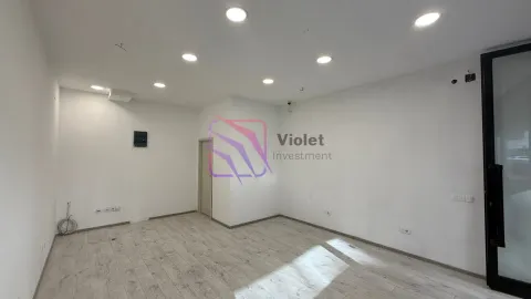 Empty bright room with white walls and wooden flooring. - image 4