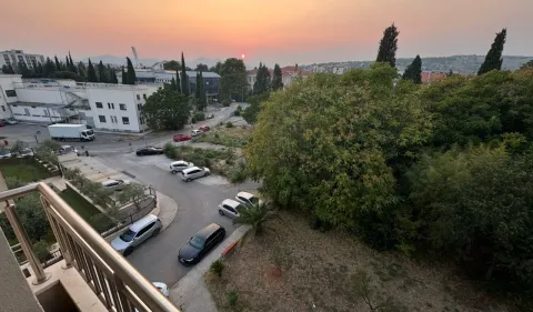 View from the terrace of the surrounding city and sunset. - image 9