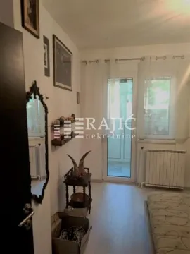Living room with furniture, wall decorations and access to the terrace. - image 5