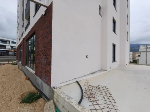 View of the exterior of a modern residential building with brick details. - image 5