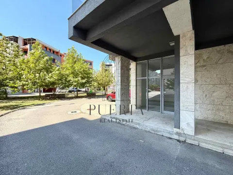 Exterior of the commercial space with a covered entrance. - image 14