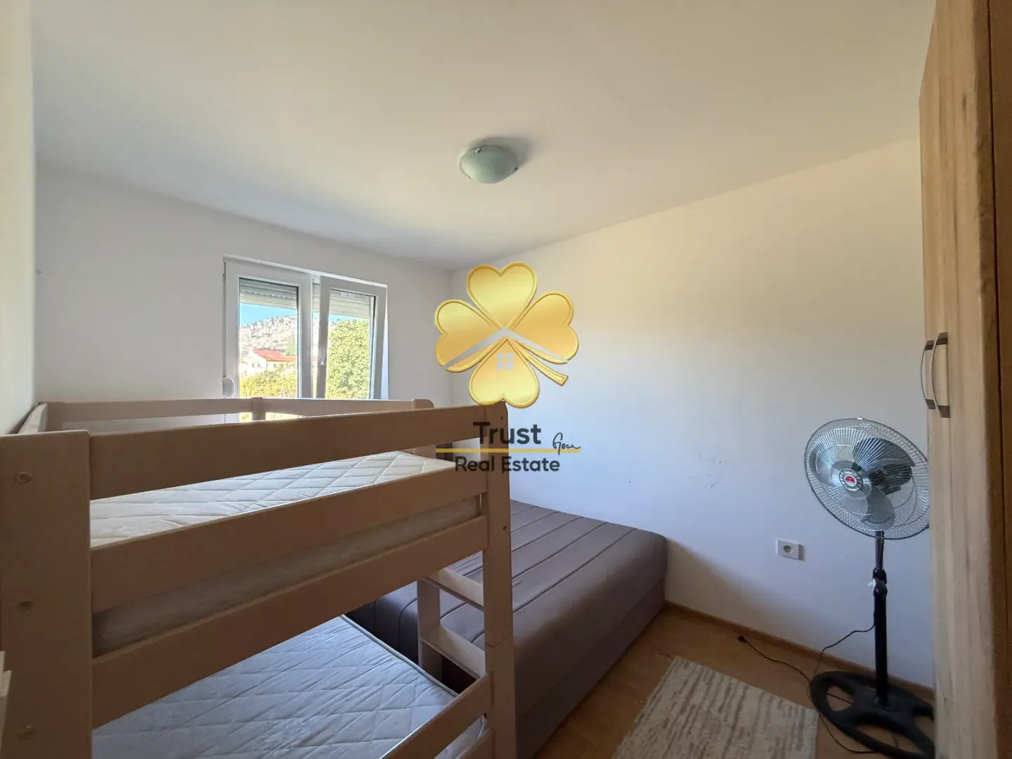 Children's bedroom with a bunk bed.