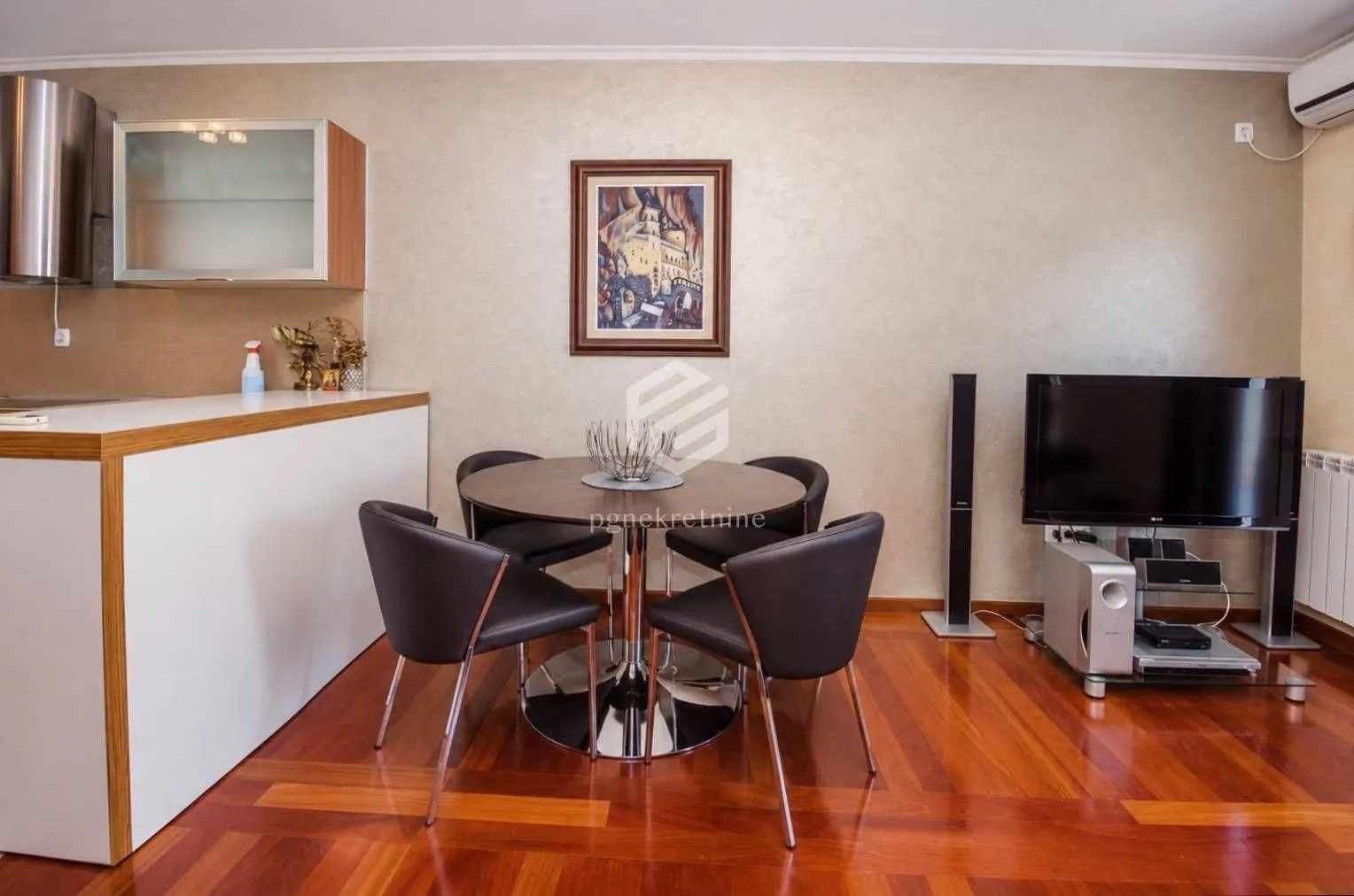 Living room with a dining table and chairs.