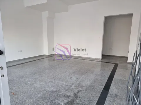 Empty unfurnished room with light walls and grey floor tiles. - image 6