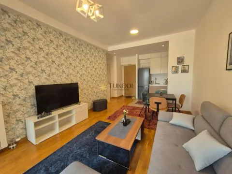 Living room connected with dining area and kitchen. - image 2