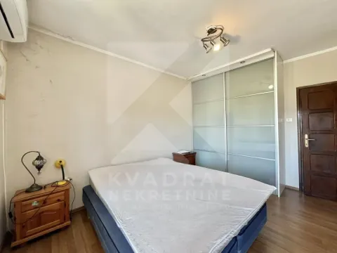Bedroom with a double bed, large wardrobe and wooden flooring. - image 5