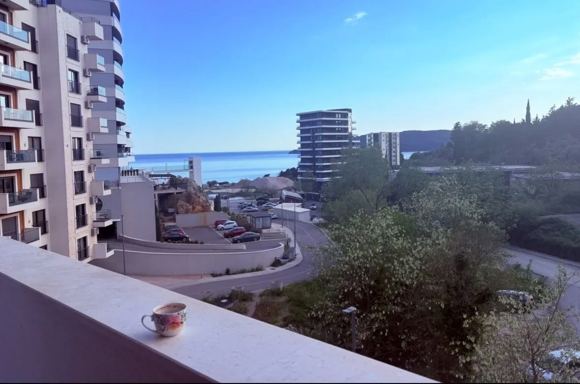 Sea view from the terrace with a cup of coffee.