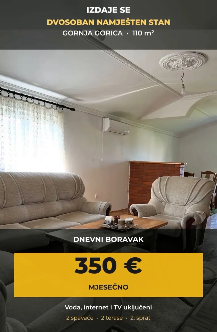 Prostrani dnevni boravak sa garniturom za sedenje i trpezarijskim delom.