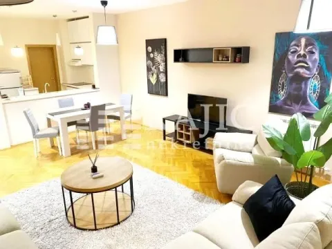 Spacious living room connected to the dining area and kitchen. - image 5