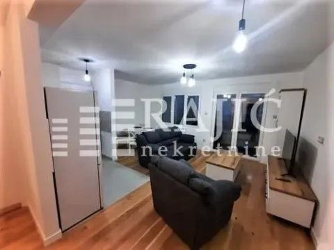 Living room with sofa set and dining area in the background. - image 4