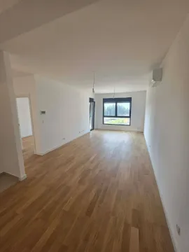 Empty bright room with wooden flooring and a window. - image 5