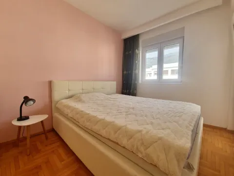 Bedroom with a double bed and a nightstand. - image 13