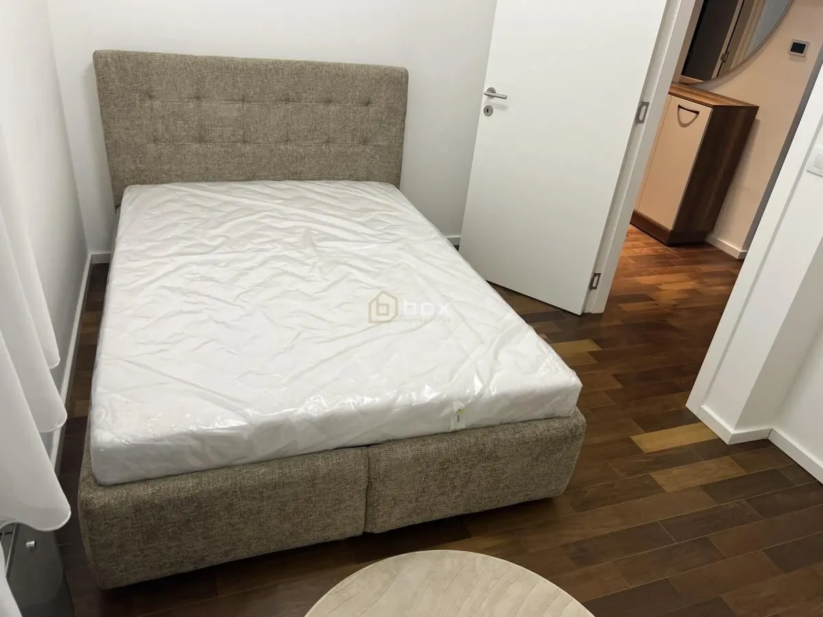 Smaller bedroom with a double bed.