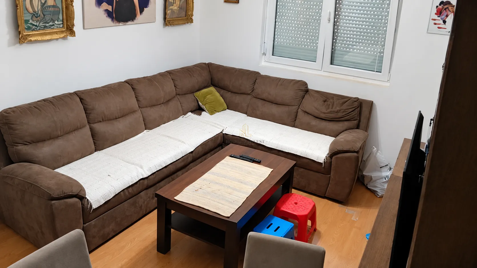 Living room with a sectional sofa and a coffee table.
