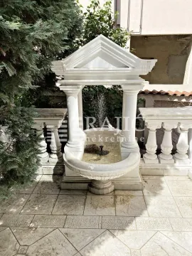 Decorative stone fountain in the courtyard with balustrades. - image 9