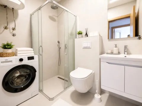 Moderna i uredna kupatila opremljena tuš kabinom, sanitarijama i veš mašinom. - image 6