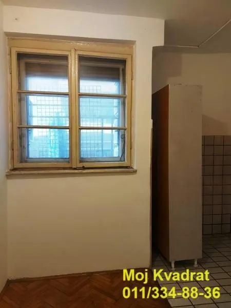 View of the window and part of the room with a wardrobe.