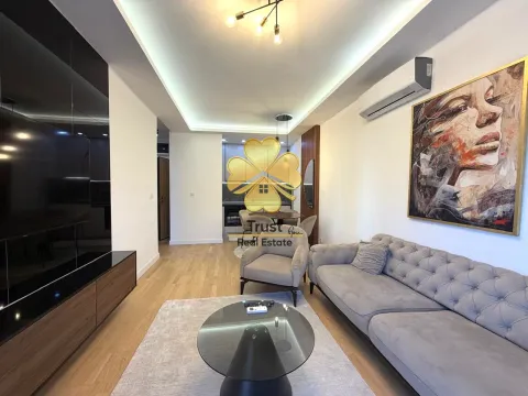 Modern and bright living room with a sofa and dining area in the background. - image 5