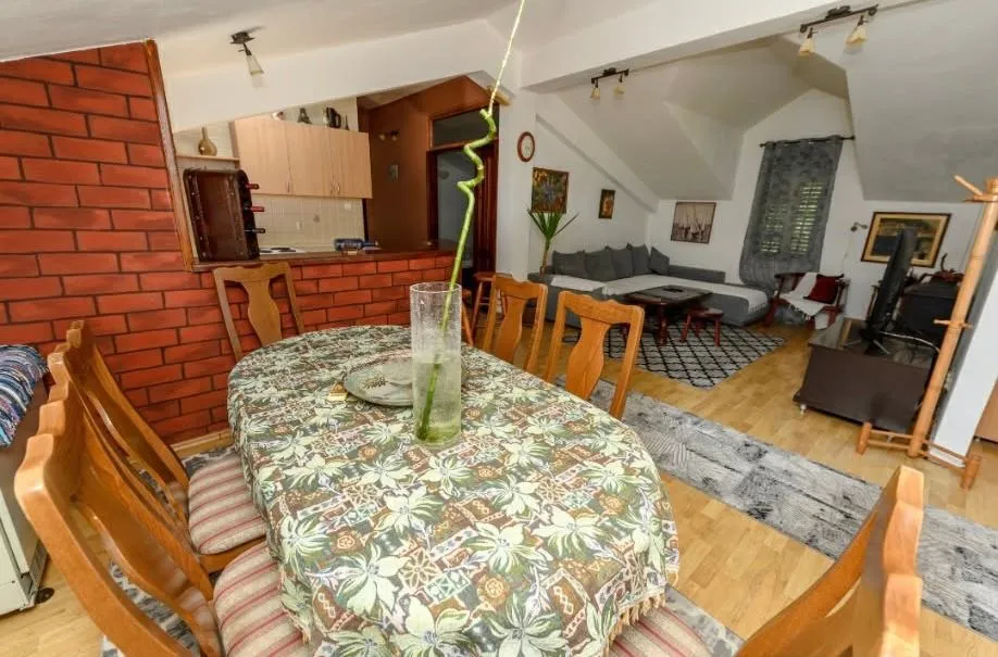 Living room with dining area and open floor plan.