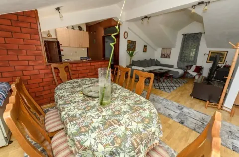 Living room with dining area and open floor plan. - image 5