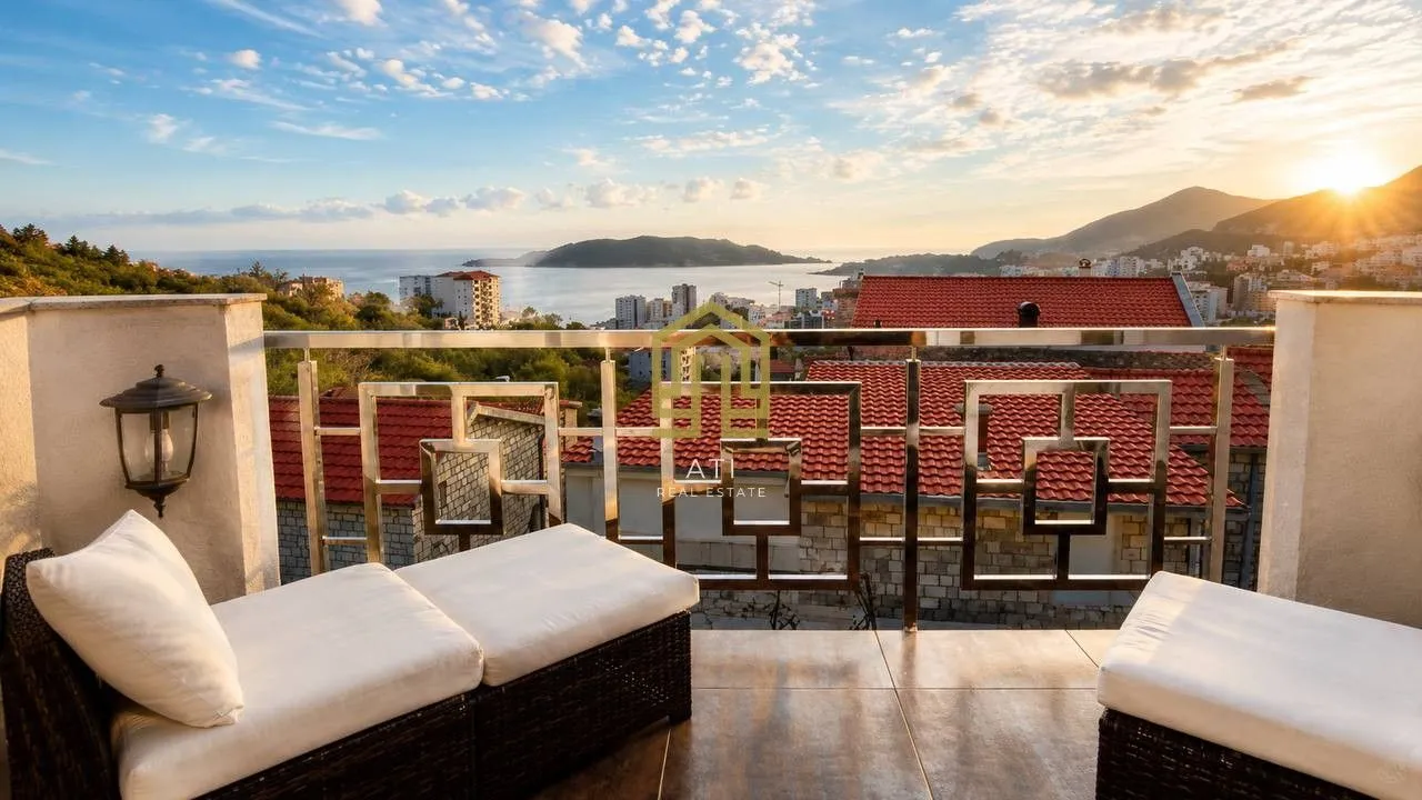 Spacious terrace with comfortable loungers and a panoramic sea view.