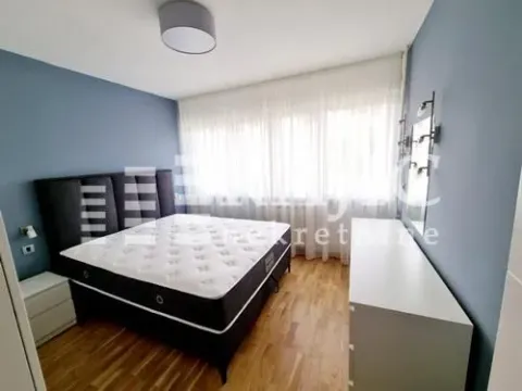 Furnished bedroom with a double bed. - image 11